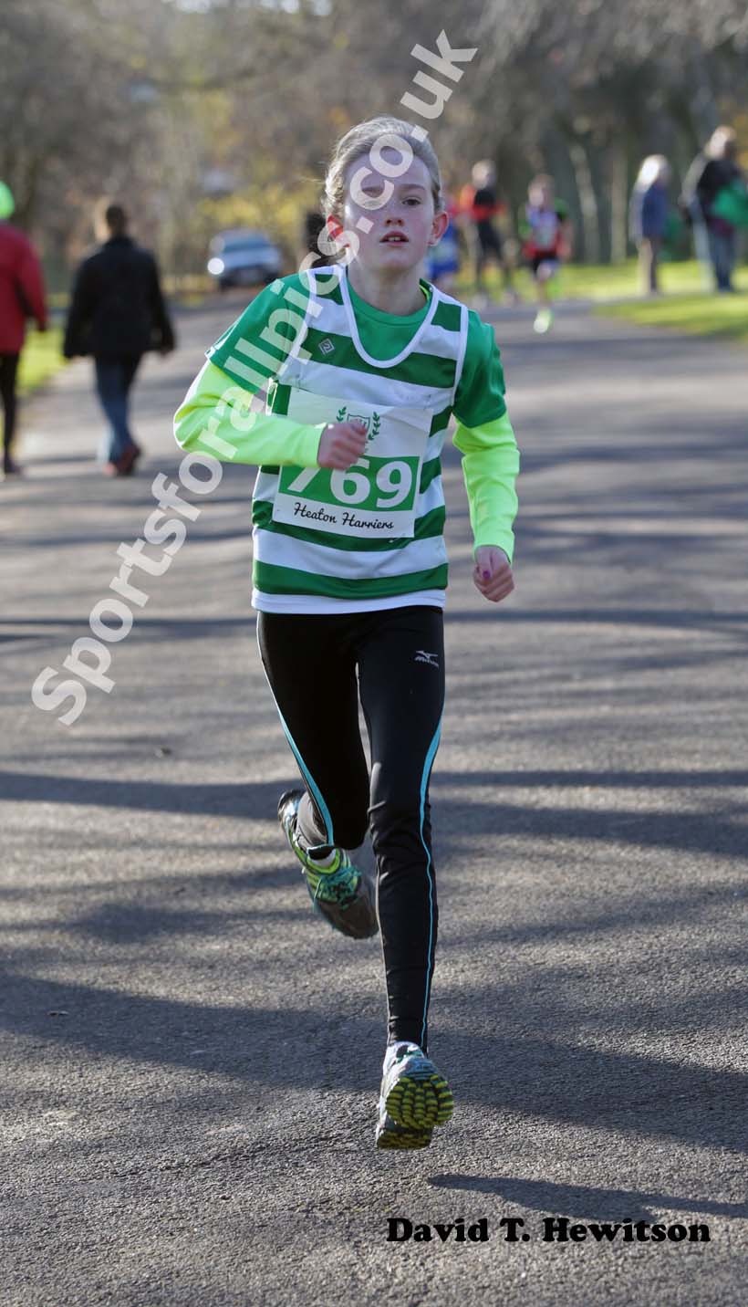 Rhian Purves  wins the under-13s Heaton Memorial Road Race.
